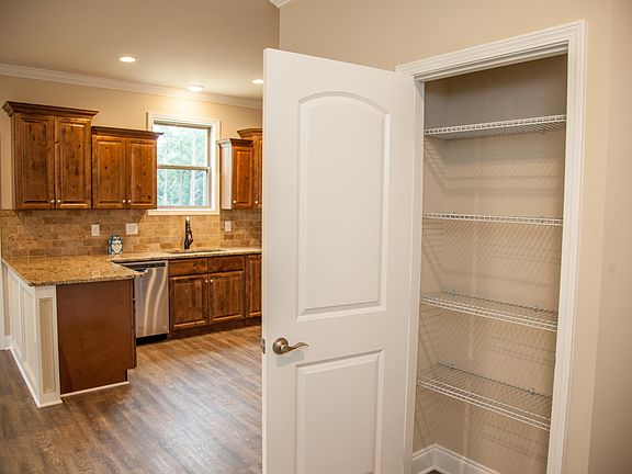 Built-in pantry off of the kitchen
