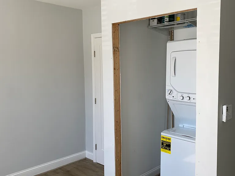 washer/dryer closet (custom doors on order) and other closet