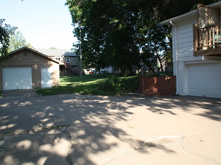 Simple detached with overhead door and man door. Concrete floor with electric only.