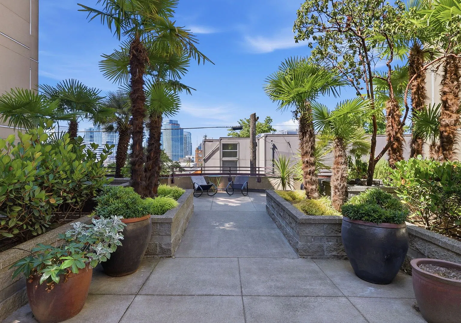 TWO Parking Spaces! Quiet Paradise in the Middle of it All — Photo 1