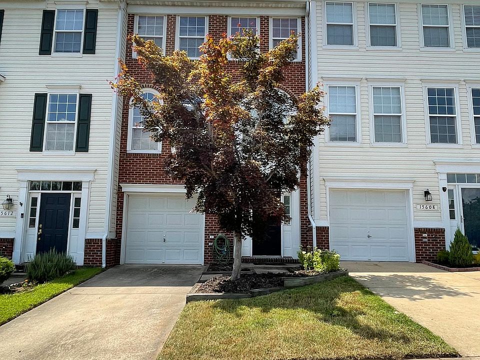 Front of house. Single car garage. Additional parking spaces adjacent to the house.