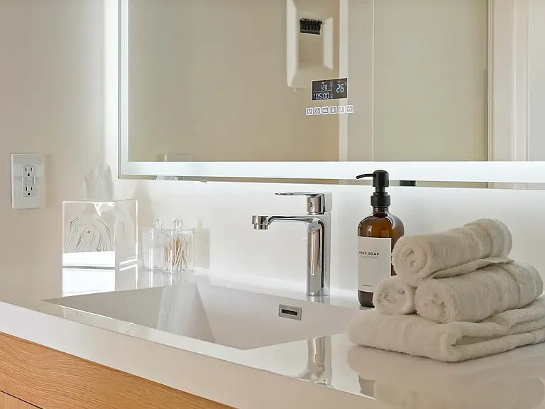 Complimentary toiletries and plush towels for a relaxing and refreshing stay.