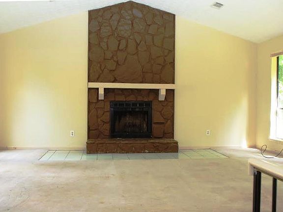 Large Vaulted Living room with majestic fireplace