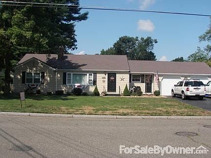 Front of house
						:
						Newly painted exterior with professional landscaping