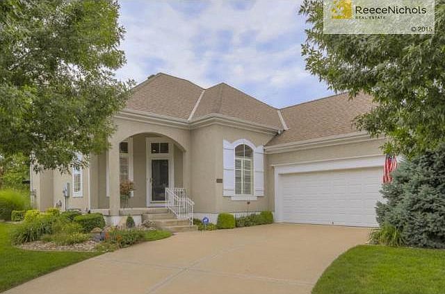 All stucco exterior for low maintenance.  Courtyard oversized ga