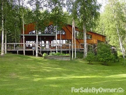 Light and bright South facing Mt. view
						:
						3.65 acres of birch and white spruce. Ornamental trees, flower beds, lawn.