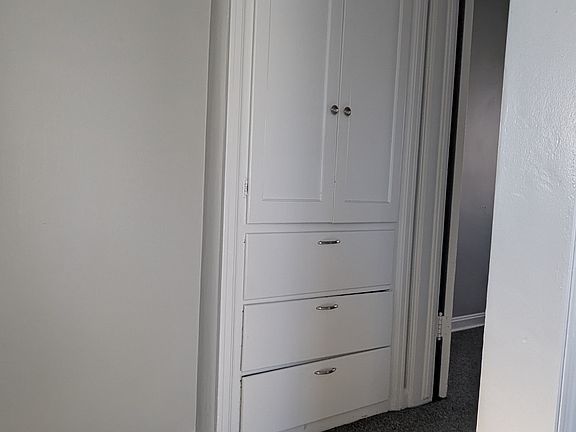 On main floor , passage into the first bedroom. There is a bath room right next to this.