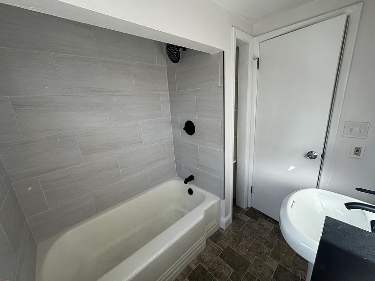 Custom tiled shower and shelving
