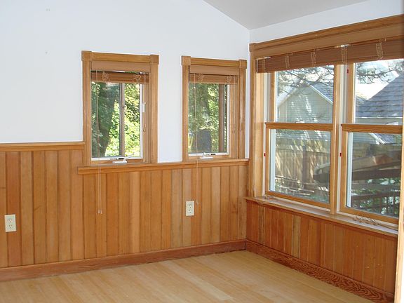 Insulated Sun-Porch/Bedroom with Bamboo floors and natural woodwork