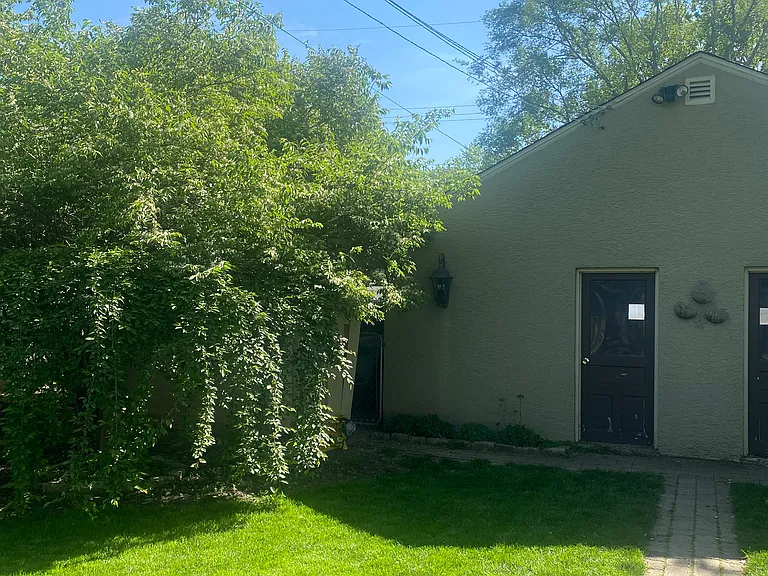 Fenced in back yard, private 1 car garage and 1 car covered carport