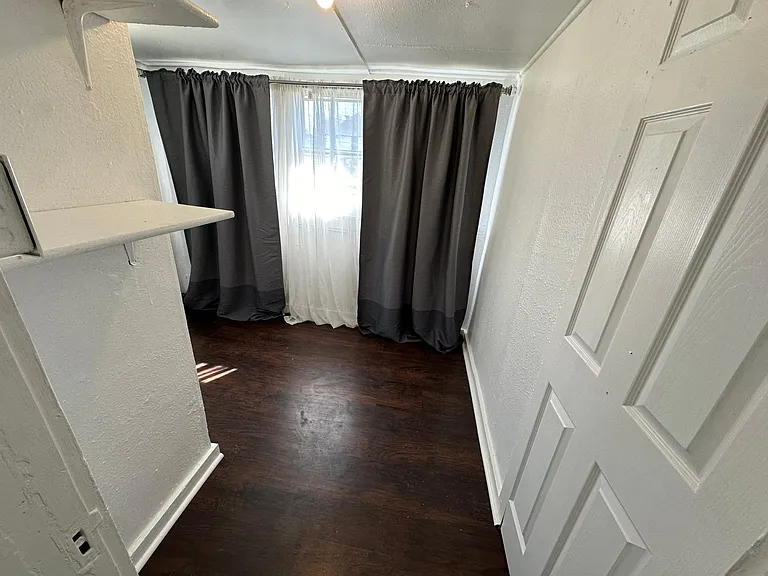 Bedroom, black out curtains and sheer curtains provided, light filled room. 
East facing windows.