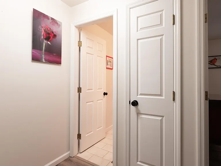 Second full bathroom. Closed door is storage closet.