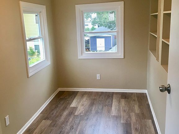 Small living room adjacent to kitchen