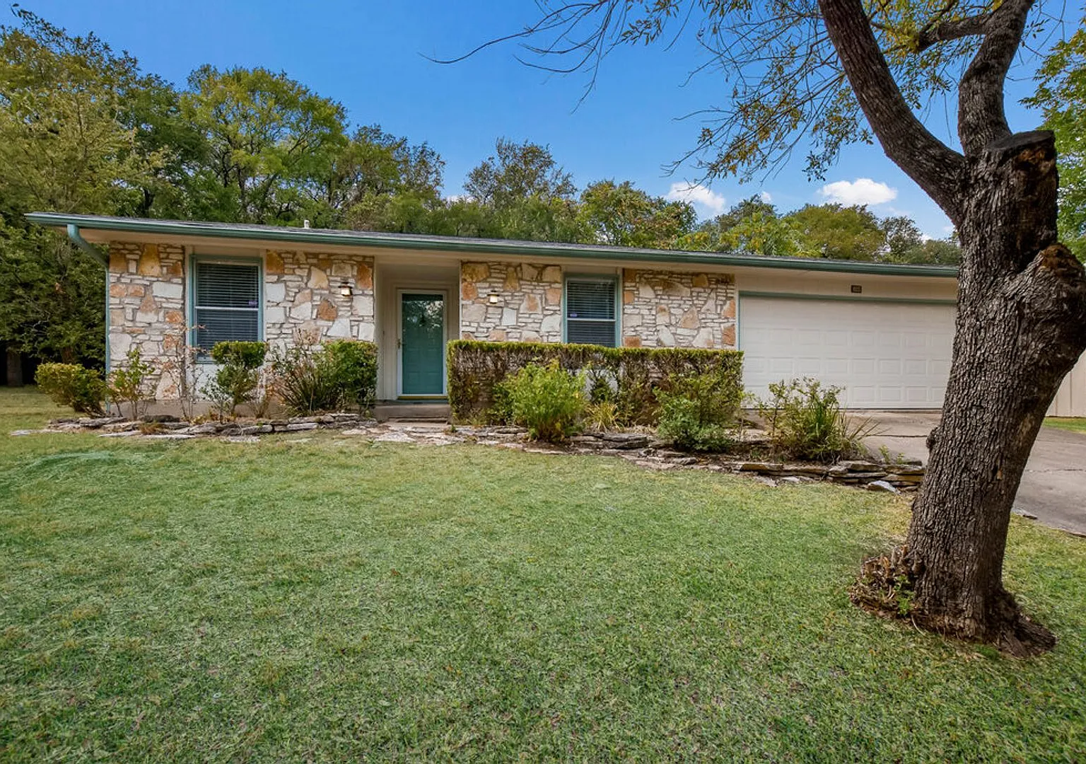 North Austin Gem with Wooded Backyard & Two-Car Garage! — Photo 3