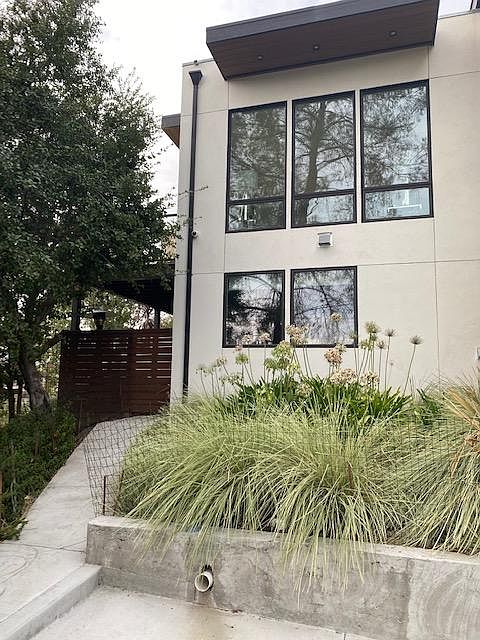 entry sidewalk to apartment, and parking