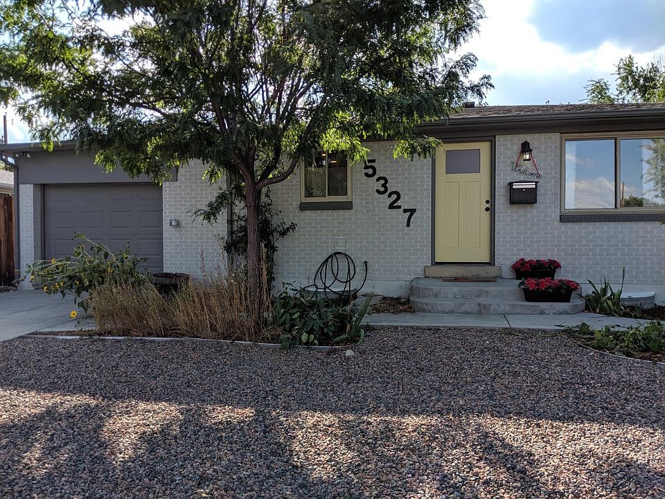 Front with garage and extra off street parking.
