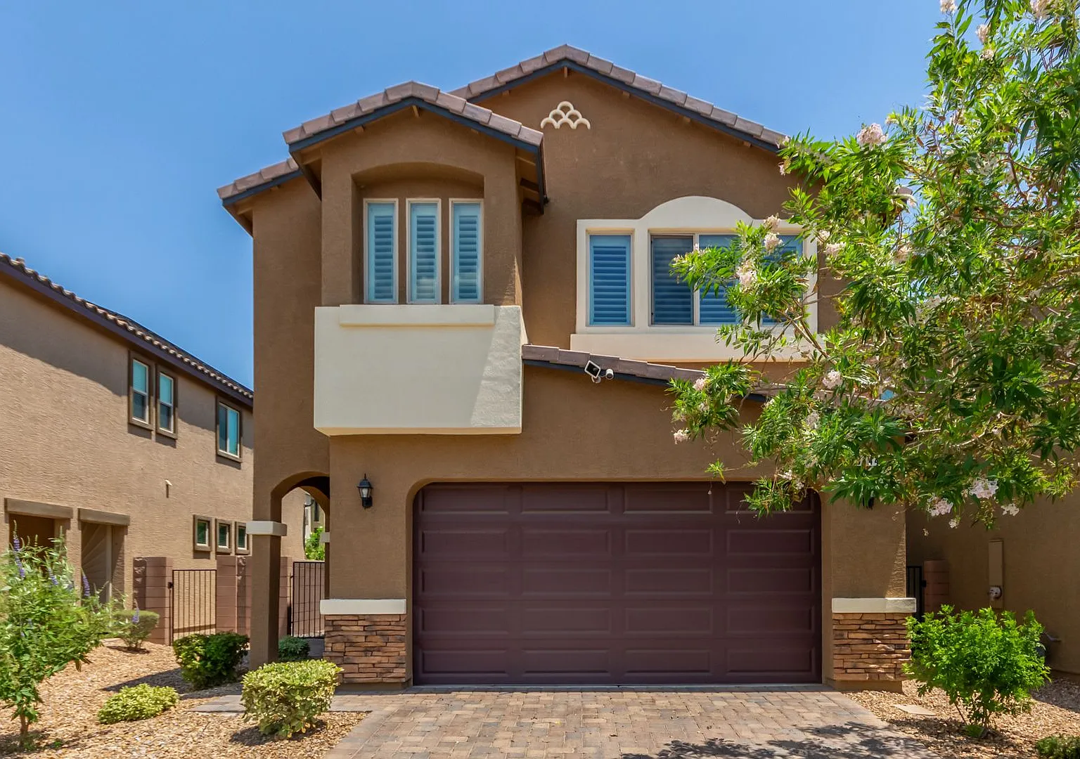 Highly upgraded gated home — Photo 1