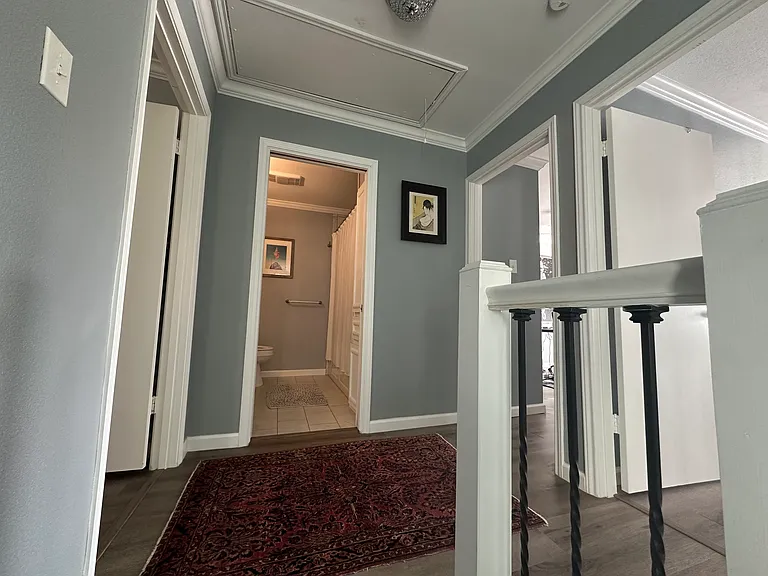 Second floor of condo: primary bedroom with en suite bathroom, guest bathroom, secondary bedroom and third bedroom or office.