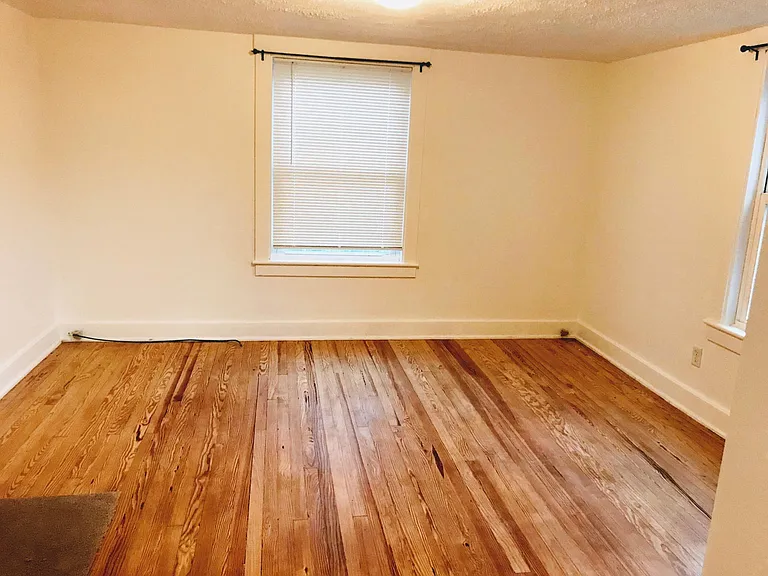 Large Living Room with refurbished hardwood floor