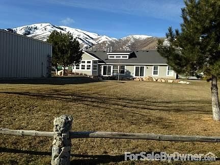 Back Yard View of Home & Shop