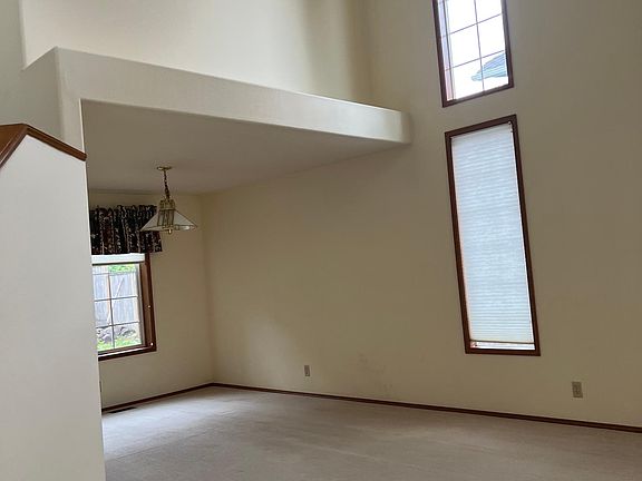 High Ceiling Living Room and Dining Room