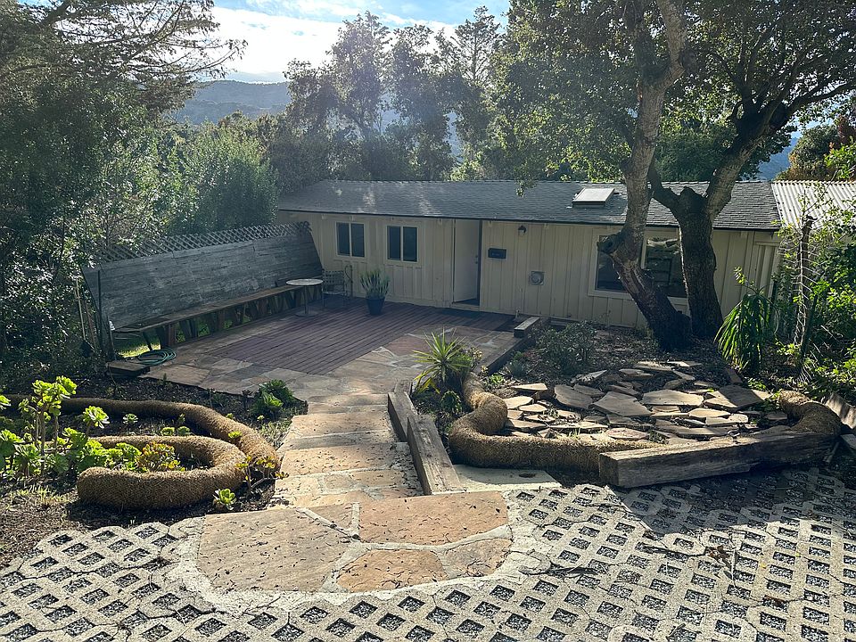 Front deck and partial garden, south valley mountains behind.