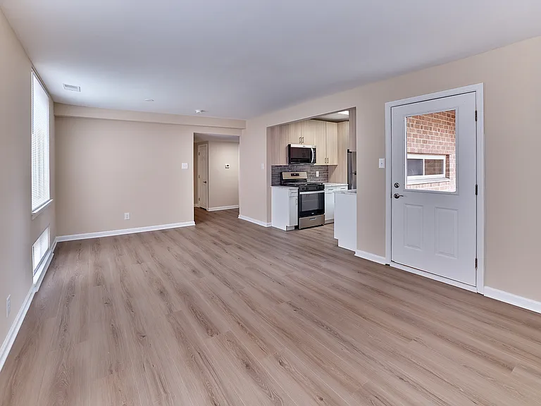 Bright 2 Bed,1.5 Bath with 989 sq. ft., open living space, and modern kitchen finishes.