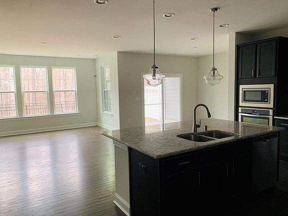 Kitchen open to Living and Dining area