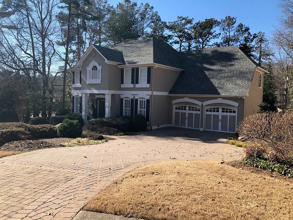 Front with paver driveway
