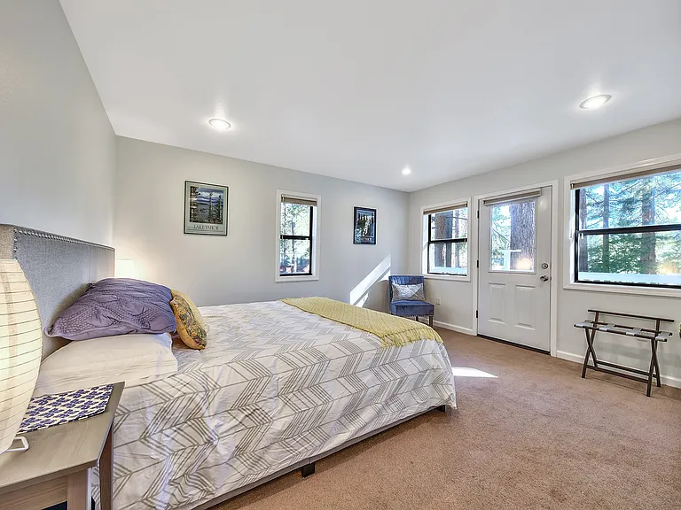 Master with Cal King bed and attached bath.