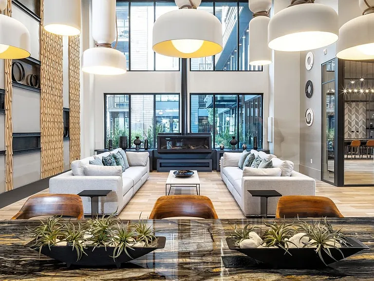 Lobby with seating area and fireplace