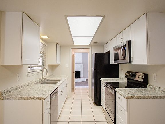 Kitchen (window overlooks backyard)