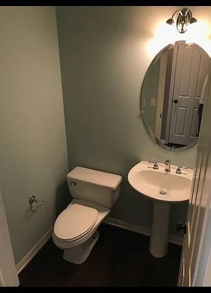 Downstairs half bathroom.