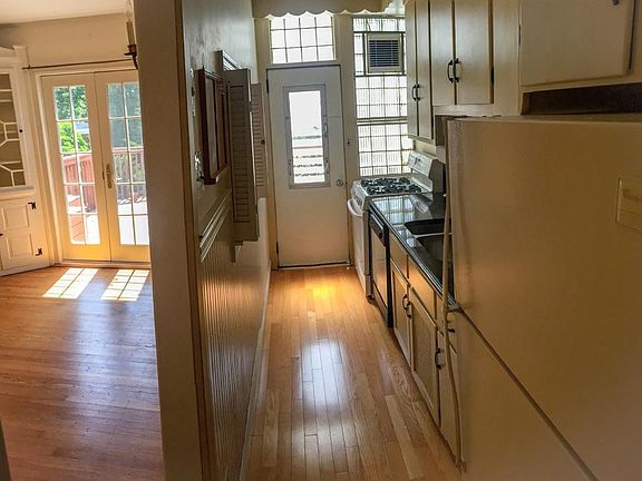Kitchen and Dining room looking out on deck