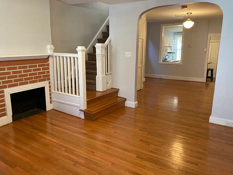 Living room looking toward dining room and kitchen
(non-functioning fireplace)
