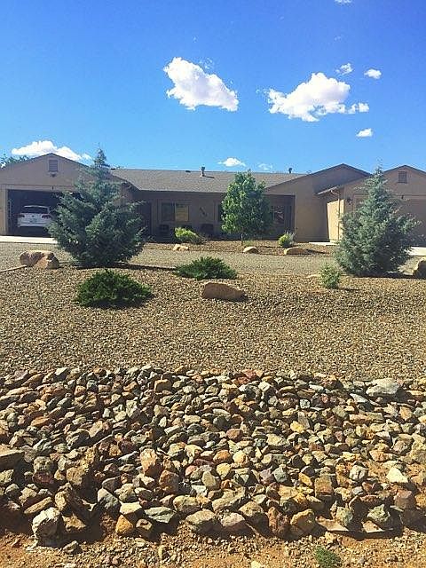 Street view of entire house. Rental unit is on the right. Note large horseshoe driveway. The street is not busy but you never have to back your car into traffic.