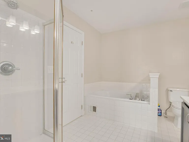 UPPER LEVEL BATHROOM WITH SOAKING TUB AND WALK IN SHOWER