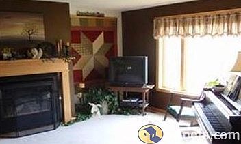 Living room, fireplace & front river view.
