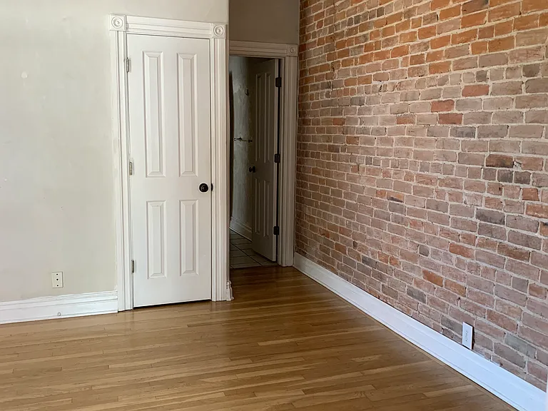 Main bedroom leading into the bathroom