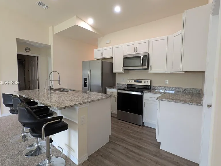 9001 Penny Cir — Photo 2