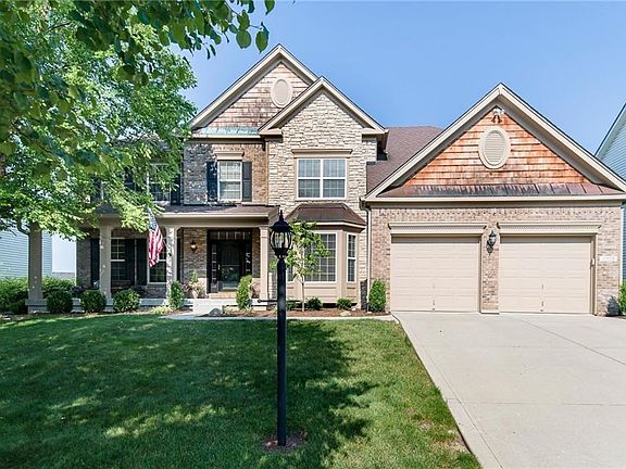 The home is located on a quiet cul-de-sac street and enjoys a picket fenced backyard and a peaceful pond setting!