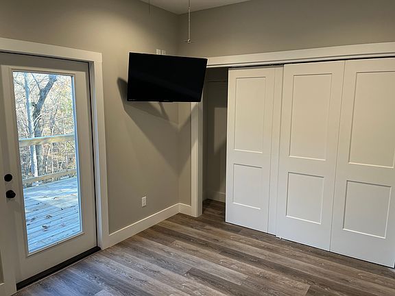 One of 2 master bedrooms