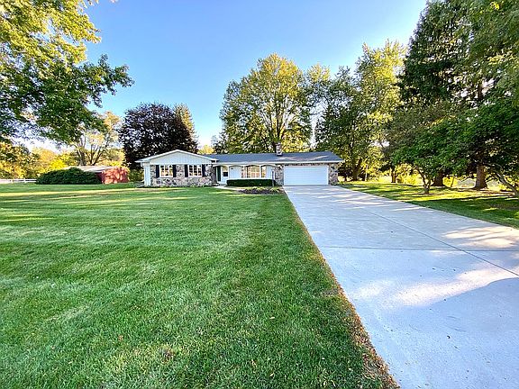 Front view with outbuilding