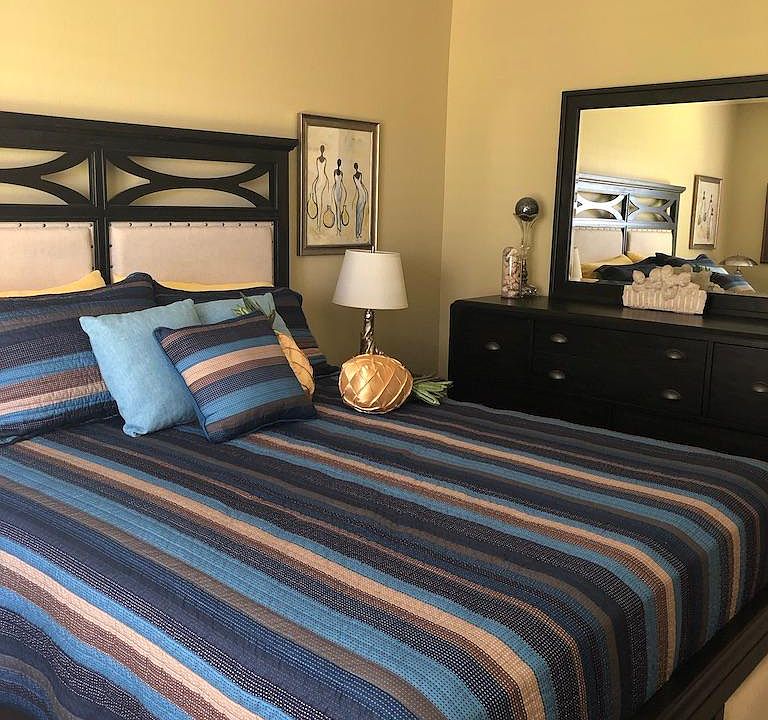 Queen Bedroom with bright window