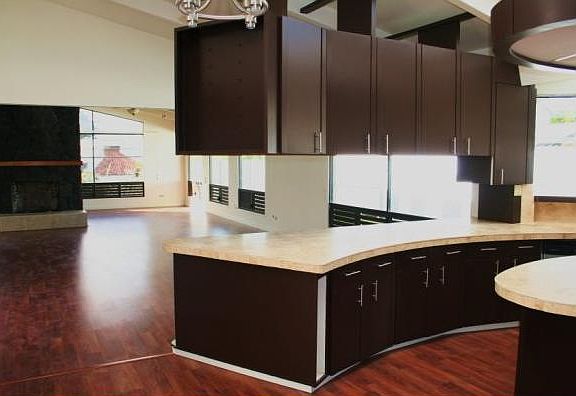 Kitchen facing the dining / living room / nook and fireplace