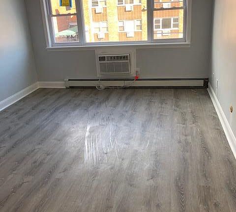 living room with brand new air conditioner 