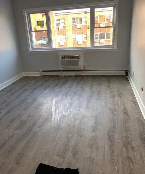 living room with brand new air conditioner
