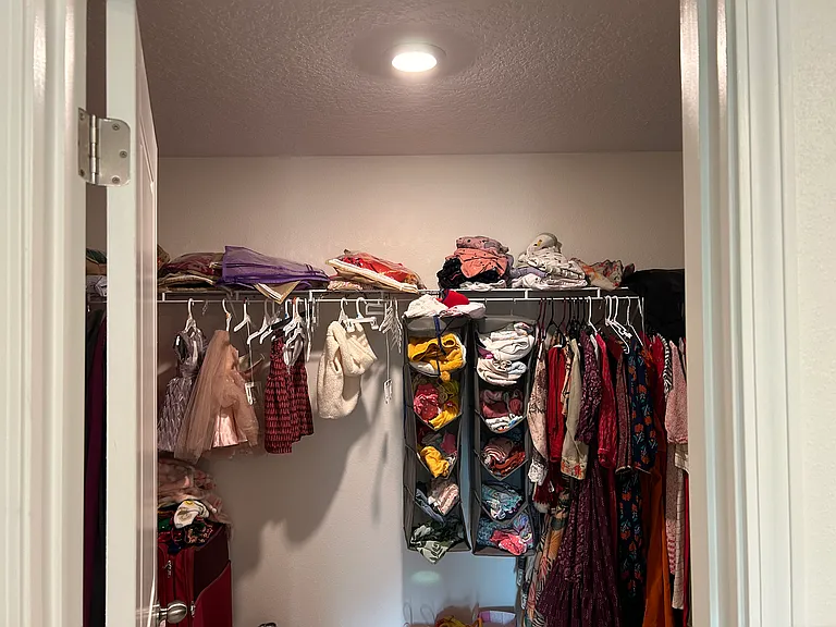 Walk in closet in master bedroom
