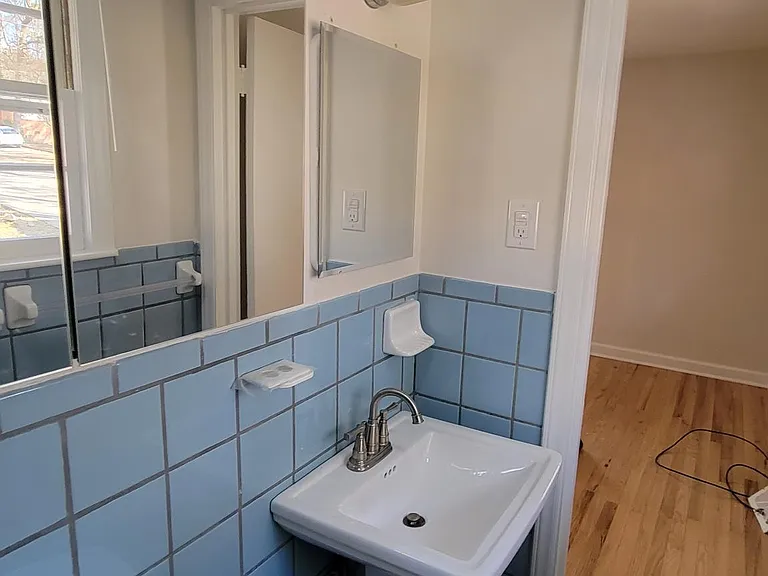 Master Bath. New shower head, cabinets & toliet hardware,