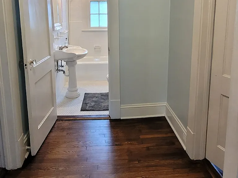 Hallway connecting dining room to main bathroom, front and master bedrooms.